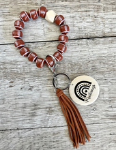 Load image into Gallery viewer, Football Wristlet